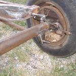 hand made shock mounts. rear cross member modified to use later model spring